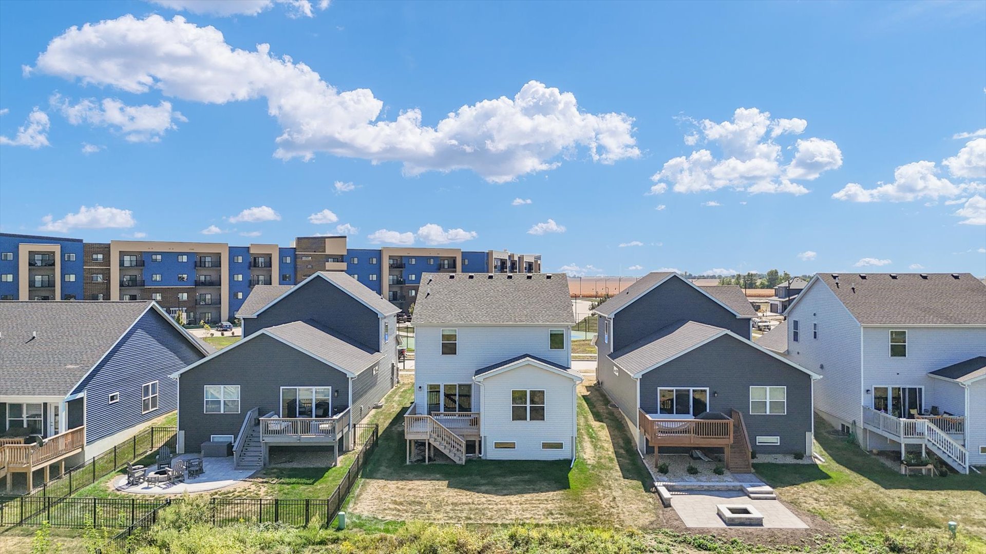 4508 Legends Drive Champaign, IL 61822 - Photo 41 of 45 a front view of a house with garden space and street view