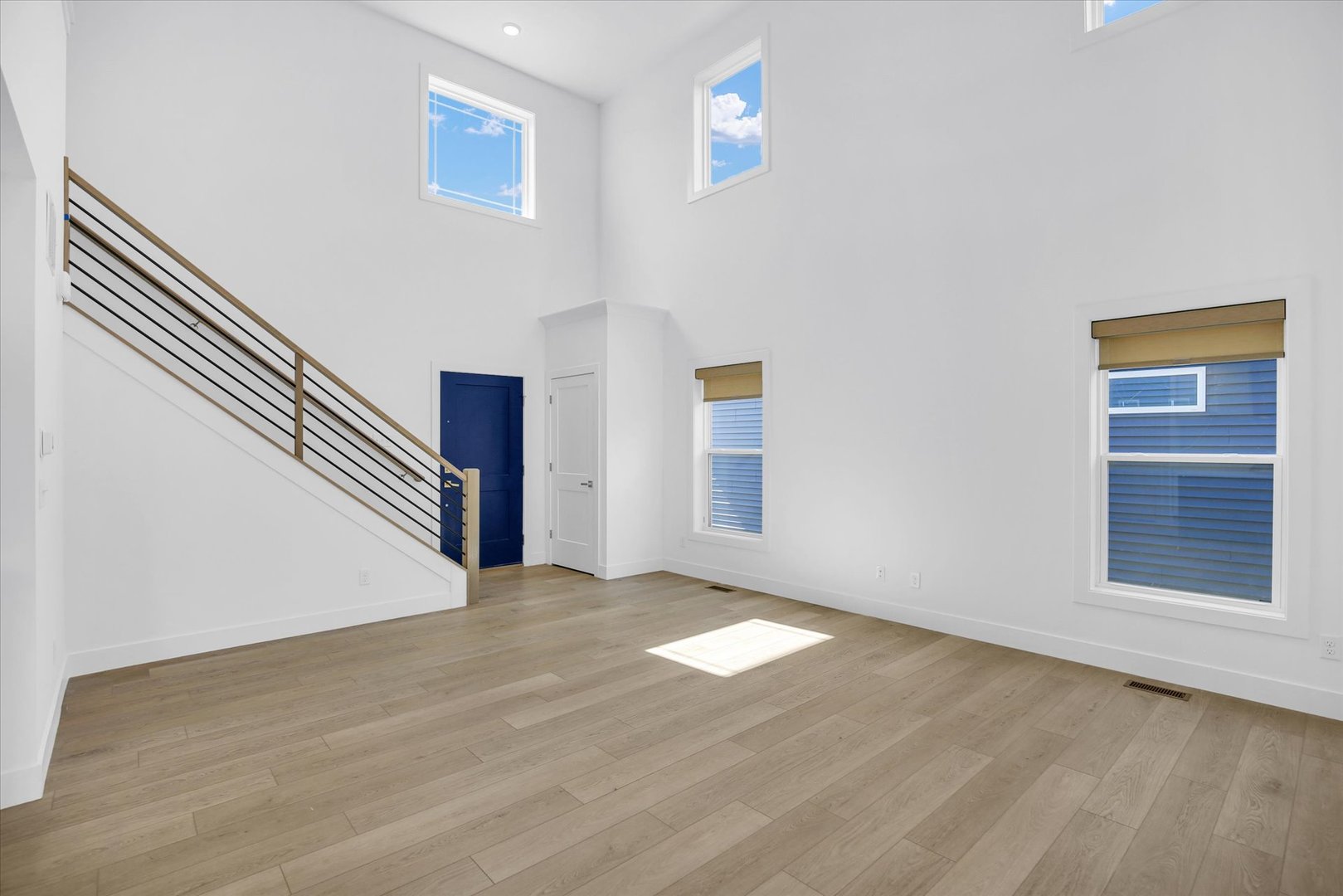 4508 Legends Drive Champaign, IL 61822 - Photo 6 of 45 a view of an empty room with wooden floor and a window