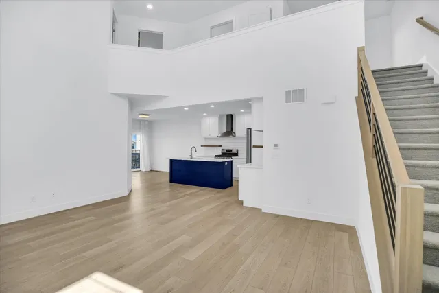 a view of kitchen with wooden floor