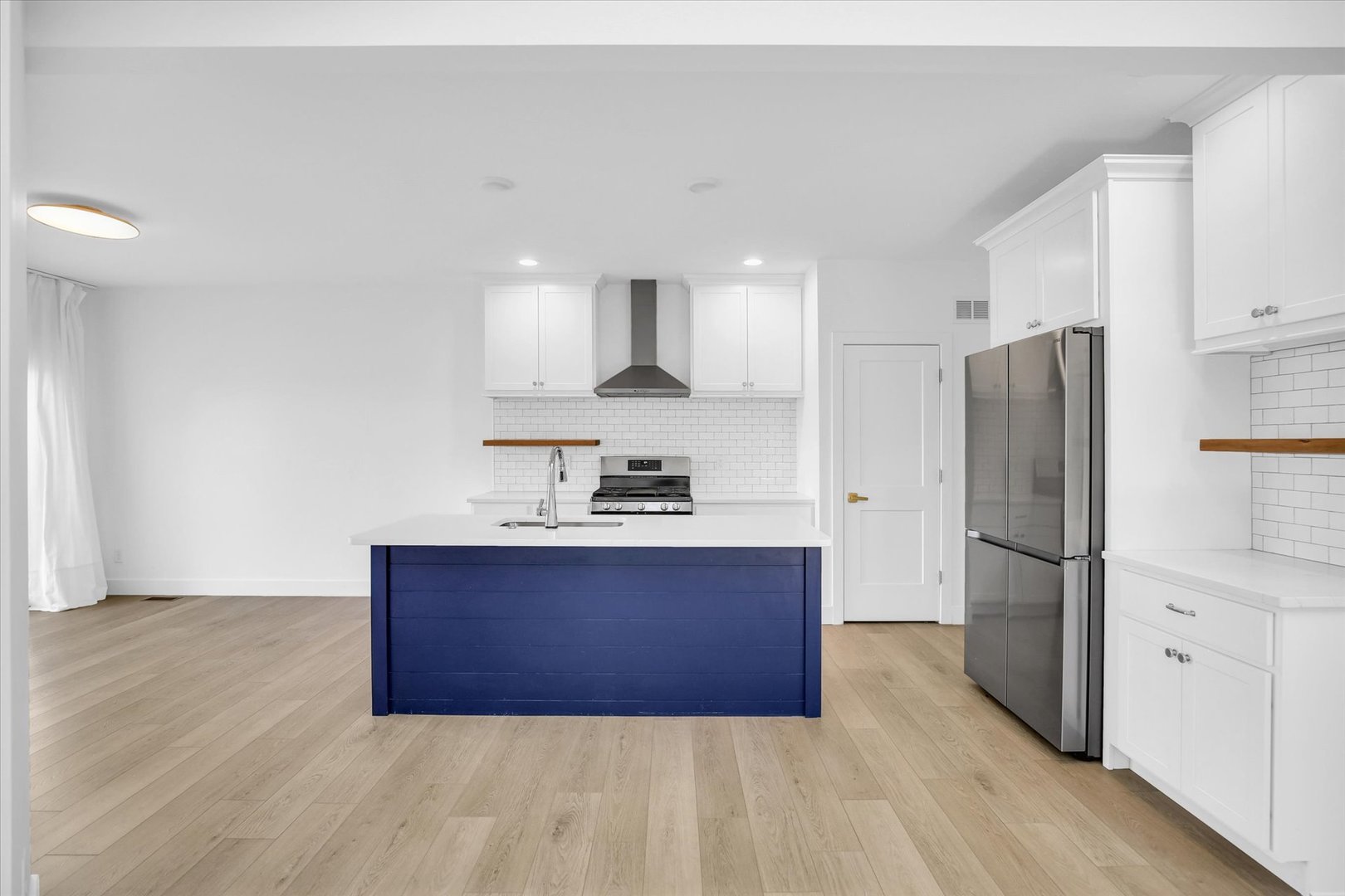 4508 Legends Drive Champaign, IL 61822 - Photo 9 of 45 a kitchen with stainless steel appliances a refrigerator and a sink