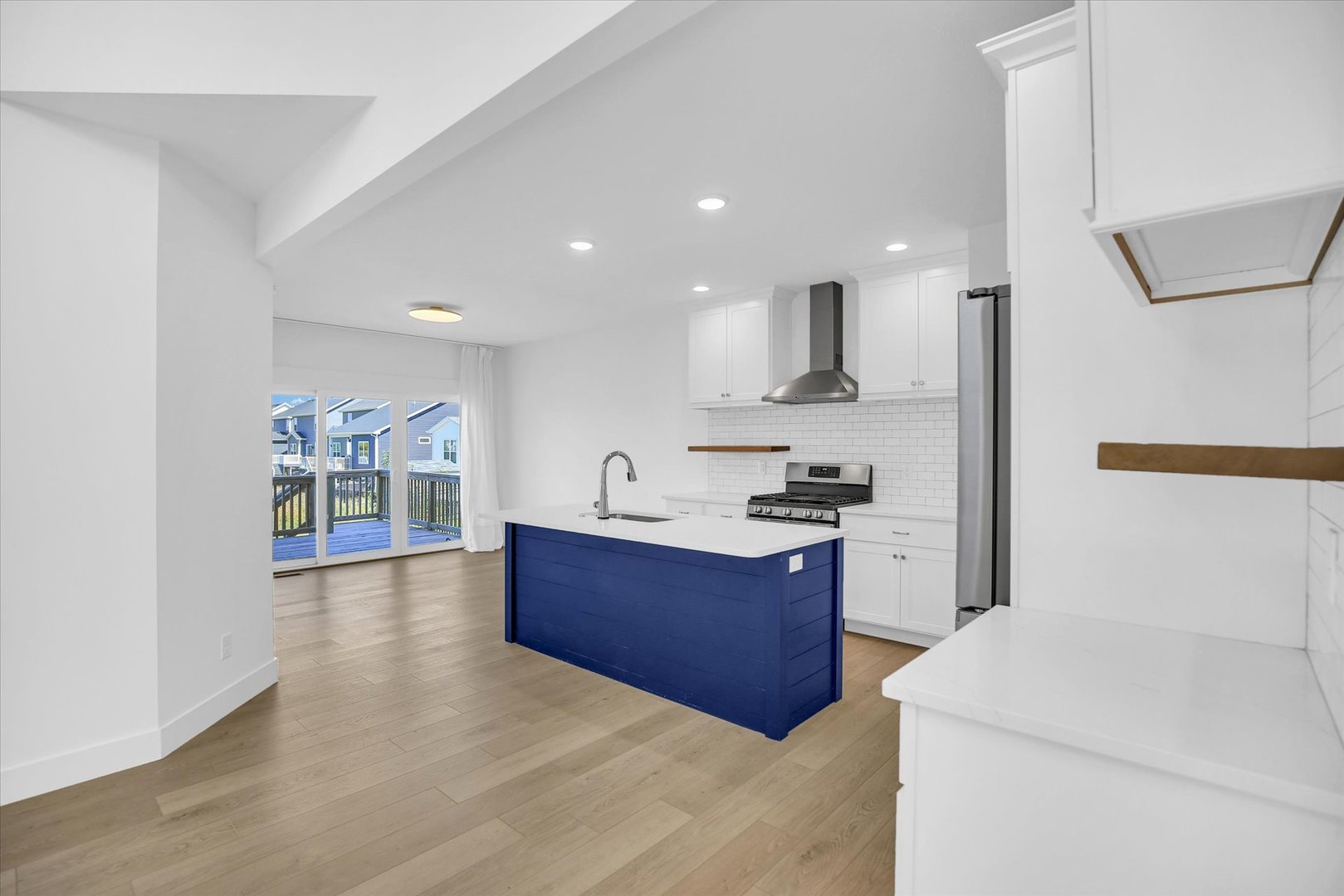 4508 Legends Drive Champaign, IL 61822 - Photo 10 of 45 a kitchen with stainless steel appliances granite countertop a stove a sink and a refrigerator