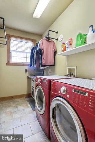 a living room with furniture fireplace and flat screen tv