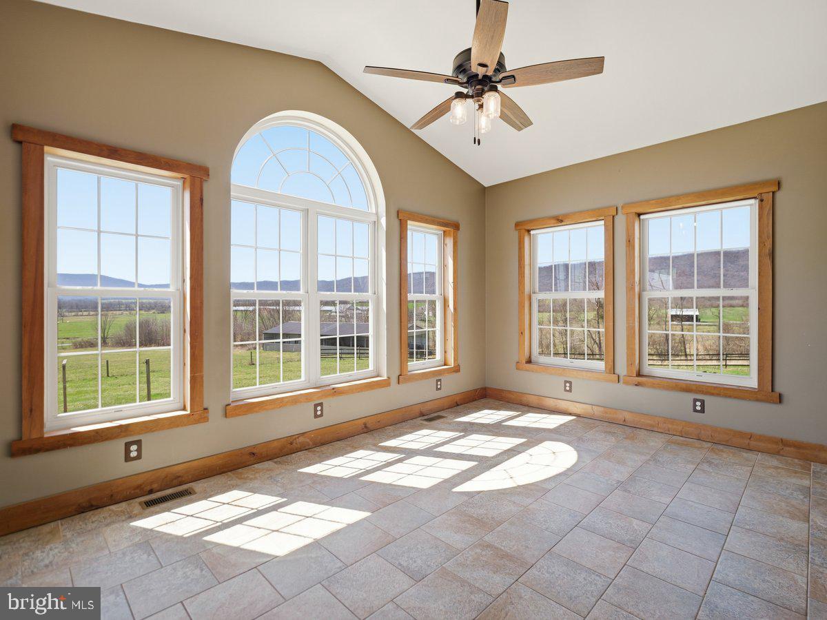 9763 Blue Spring Road Mercersburg, PA 17236 - Photo 26 of 85 a view of an empty room with a window and outdoor kitchen