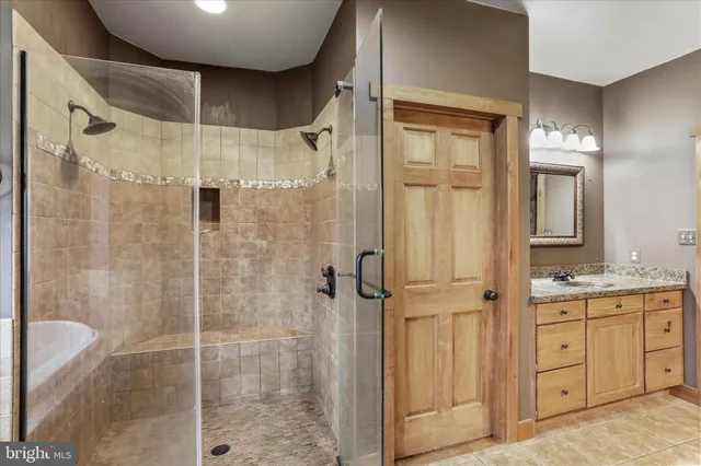 a living room with furniture a flat screen tv and outdoor space