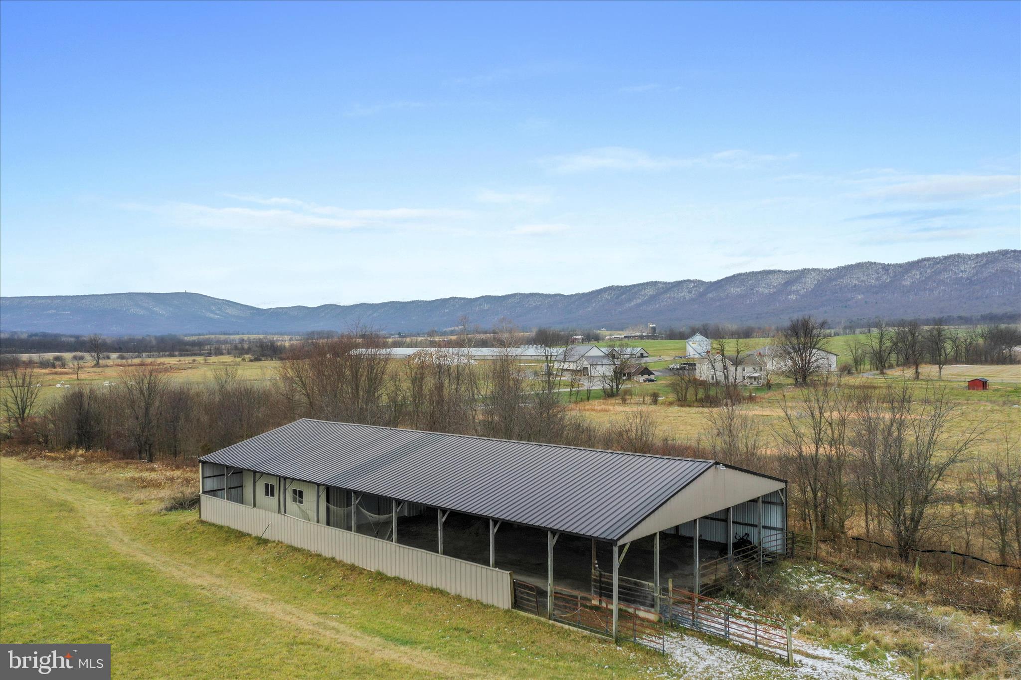 9763 Blue Spring Road Mercersburg, PA 17236 - Photo 4 of 85 a view of a lake with houses in front of it