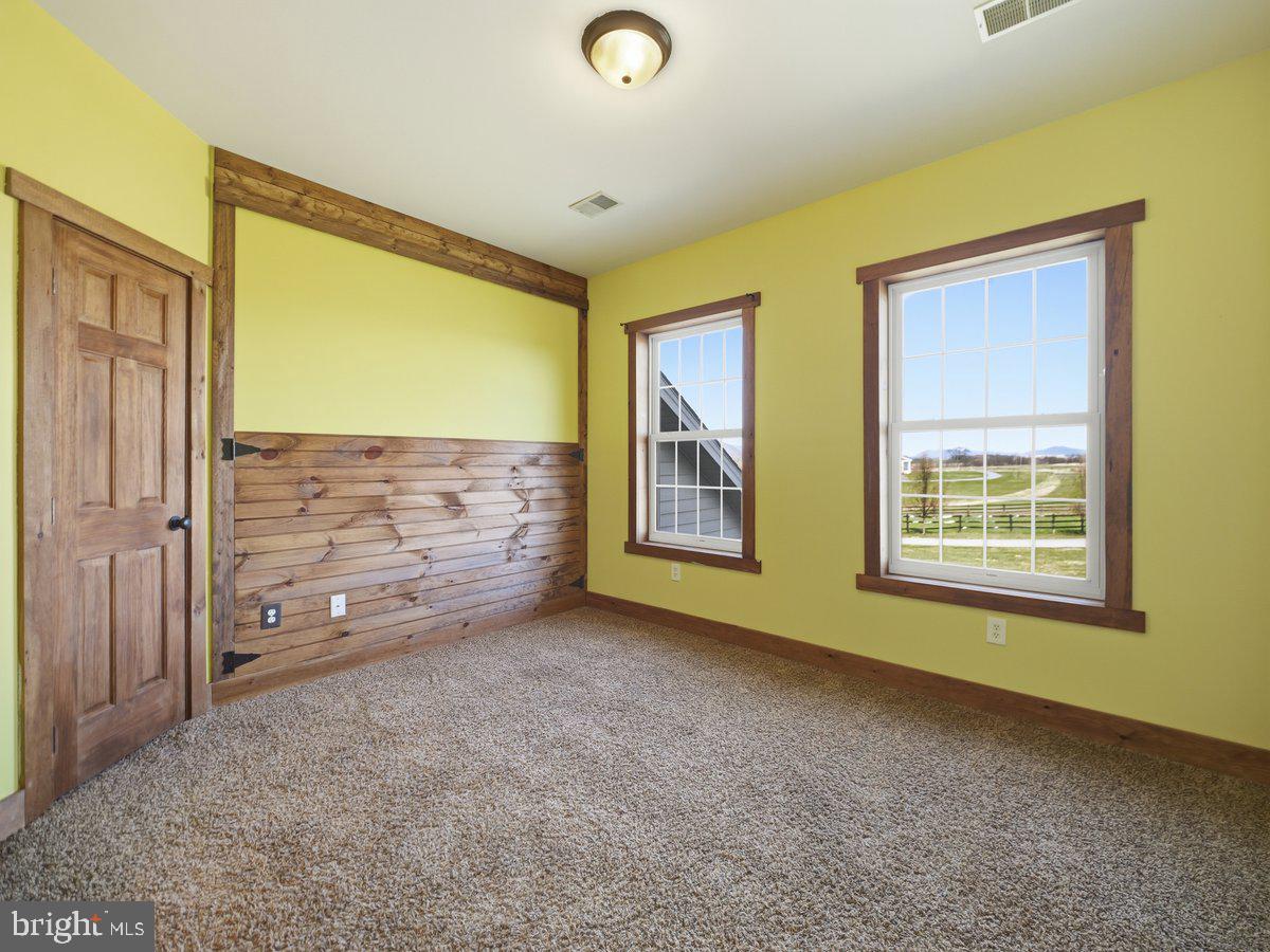9763 Blue Spring Road Mercersburg, PA 17236 - Photo 42 of 85 a view of an empty room with windows