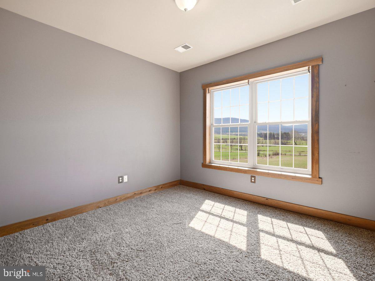 9763 Blue Spring Road Mercersburg, PA 17236 - Photo 46 of 85 a view of an empty room with a window