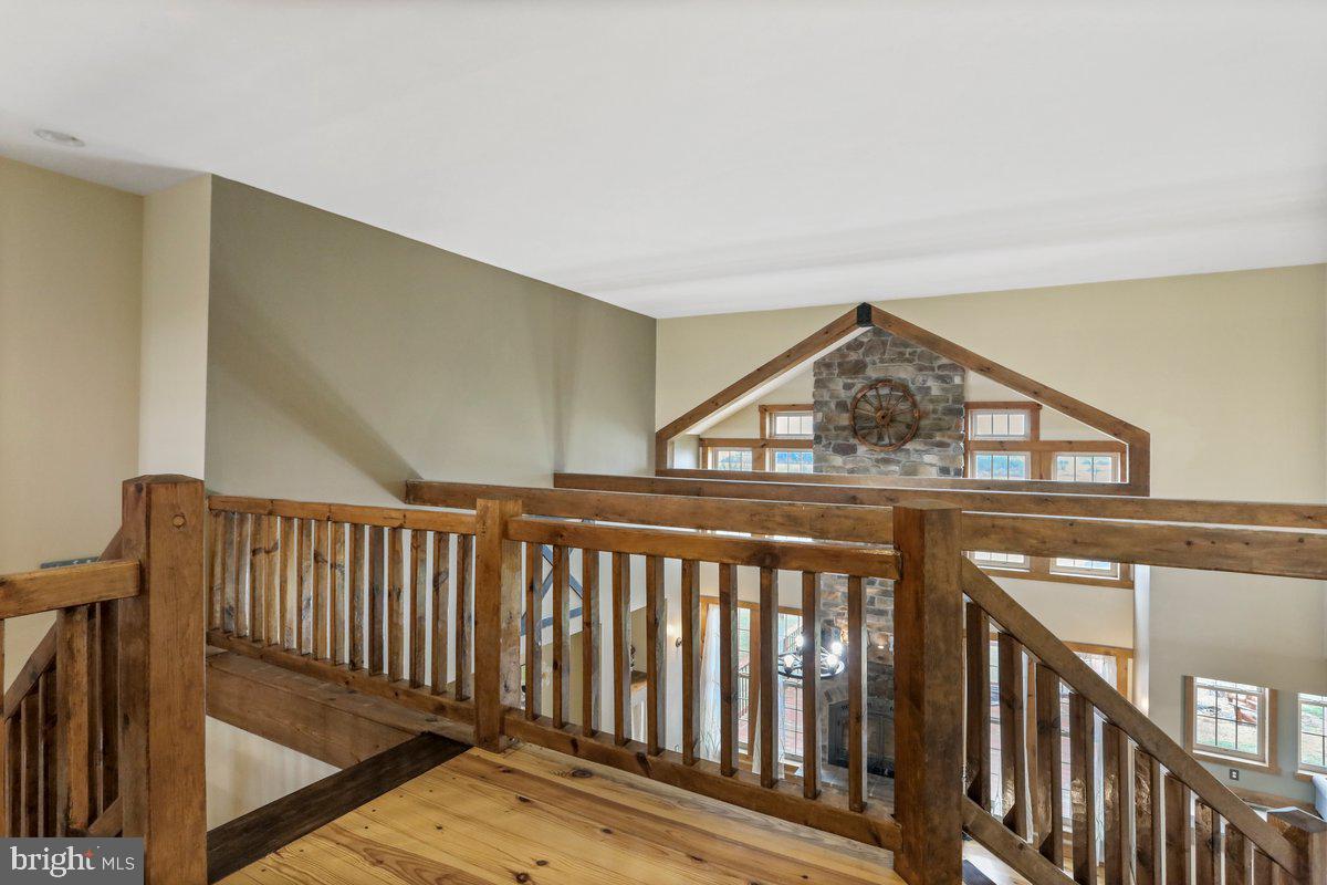 9763 Blue Spring Road Mercersburg, PA 17236 - Photo 51 of 85 a view of staircase with railing and a rug