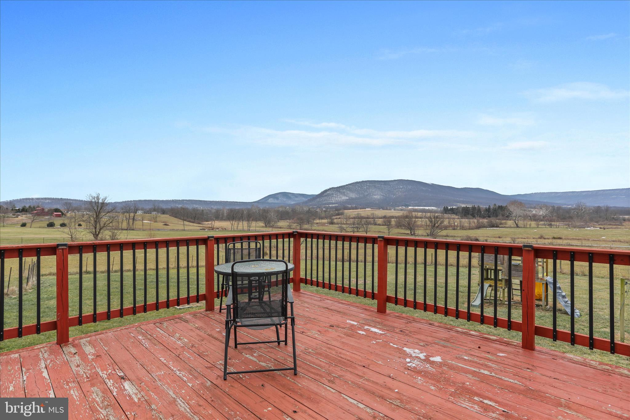 9763 Blue Spring Road Mercersburg, PA 17236 - Photo 82 of 85 a view of a balcony with wooden floor space and mountain view