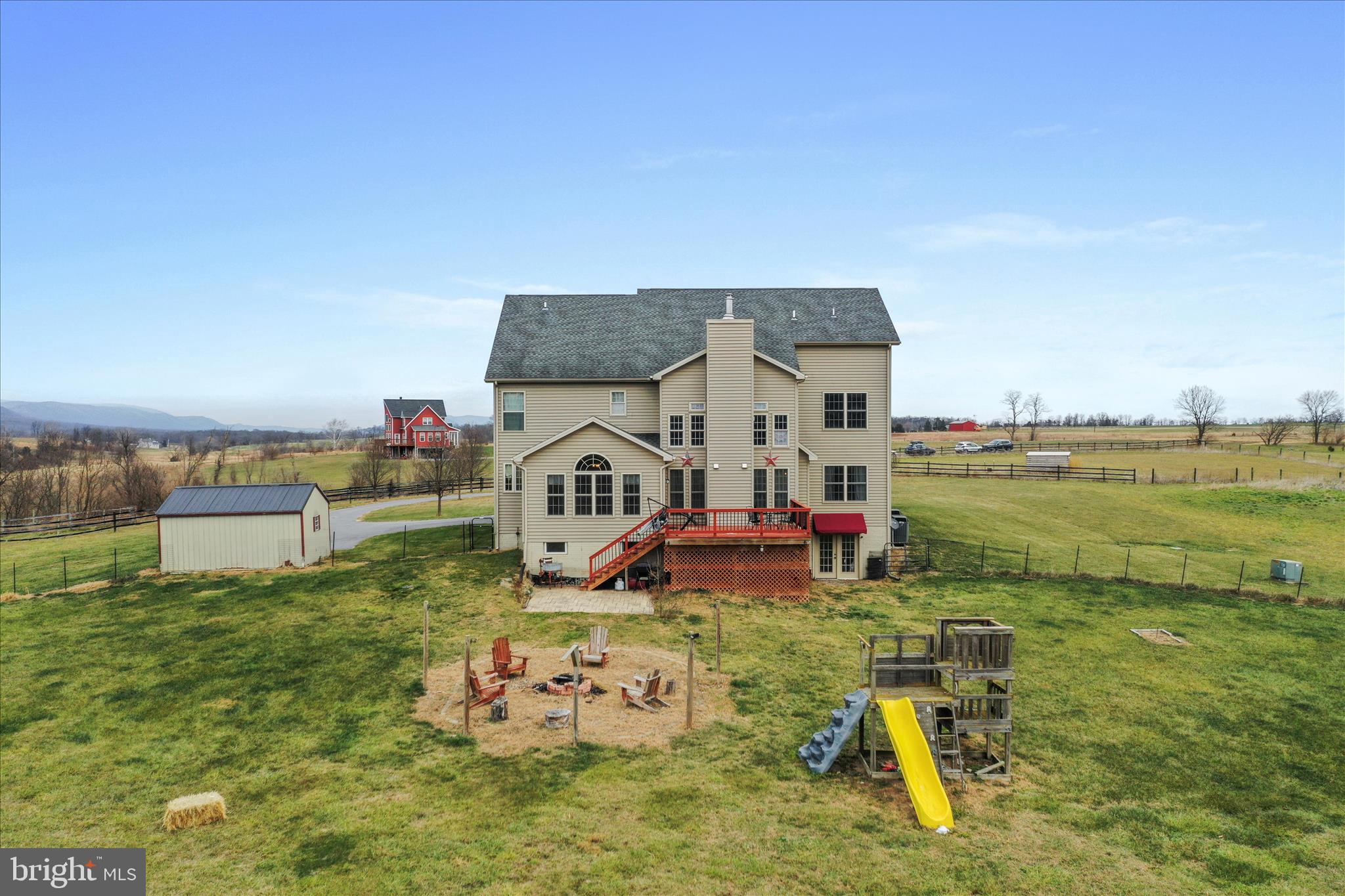 9763 Blue Spring Road Mercersburg, PA 17236 - Photo 83 of 85 a view of a lake with couches chairs and an ocean view