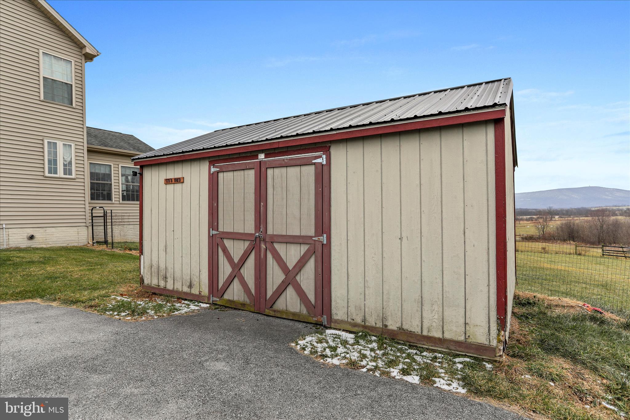 9763 Blue Spring Road Mercersburg, PA 17236 - Photo 84 of 85 a front view of a house with garden