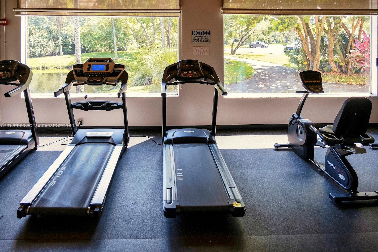 7300 Northwest 17th Street, Unit 415 Plantation, FL 33313 - Photo 18 of 19 a living room with furniture and a large window