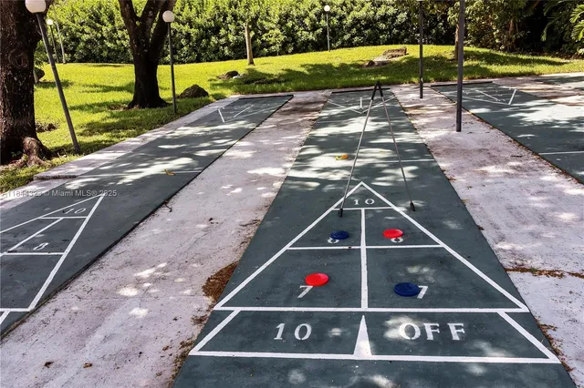 a view of swimming pool with a yard