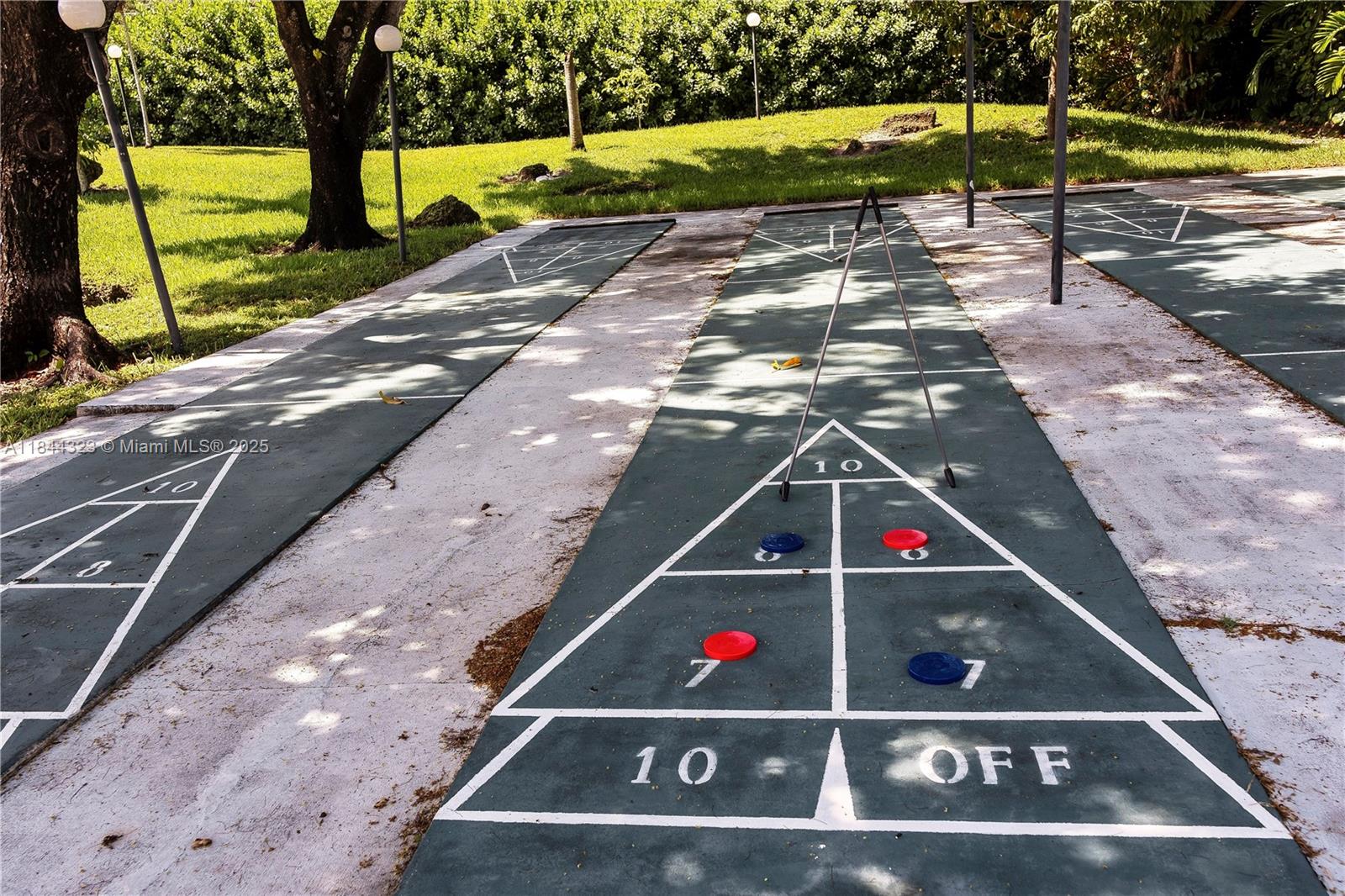 7300 Northwest 17th Street, Unit 415 Plantation, FL 33313 - Photo 19 of 19 a view of swimming pool with a yard