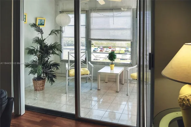 a view of a living room and dining room