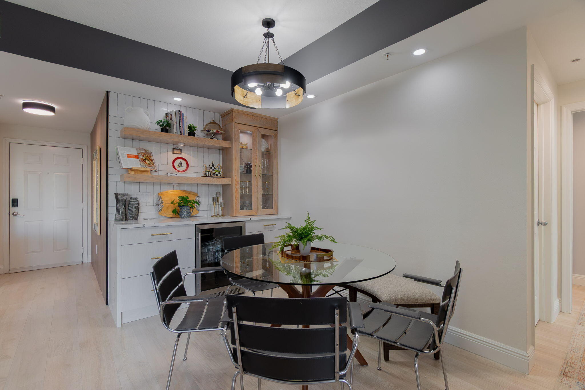 804 East Windward Way, Unit 307 Lantana, FL 33462 - Photo 12 of 44 a view of a dining room with furniture and chandelier