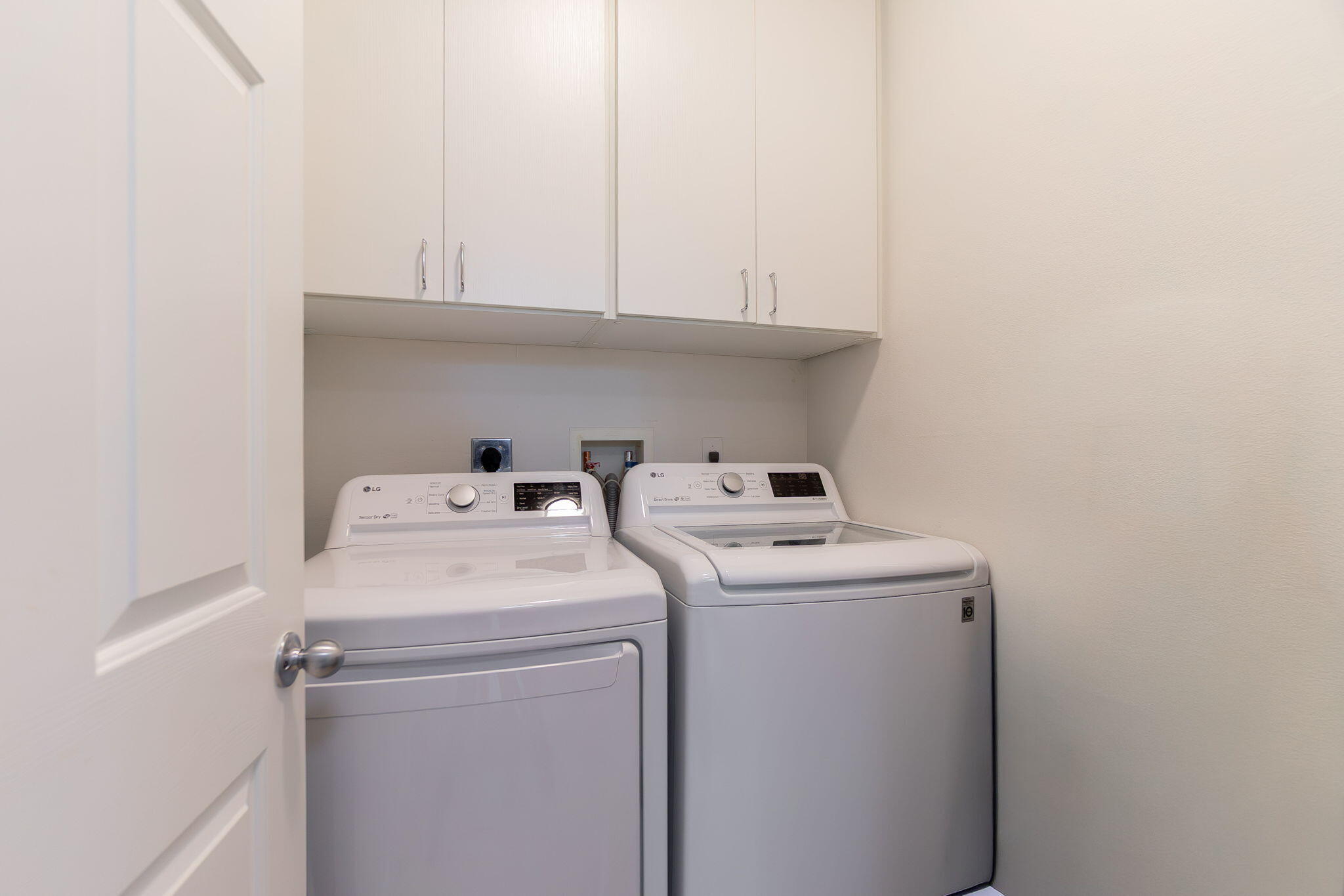 804 East Windward Way, Unit 307 Lantana, FL 33462 - Photo 27 of 44 a utility room with dryer and washer