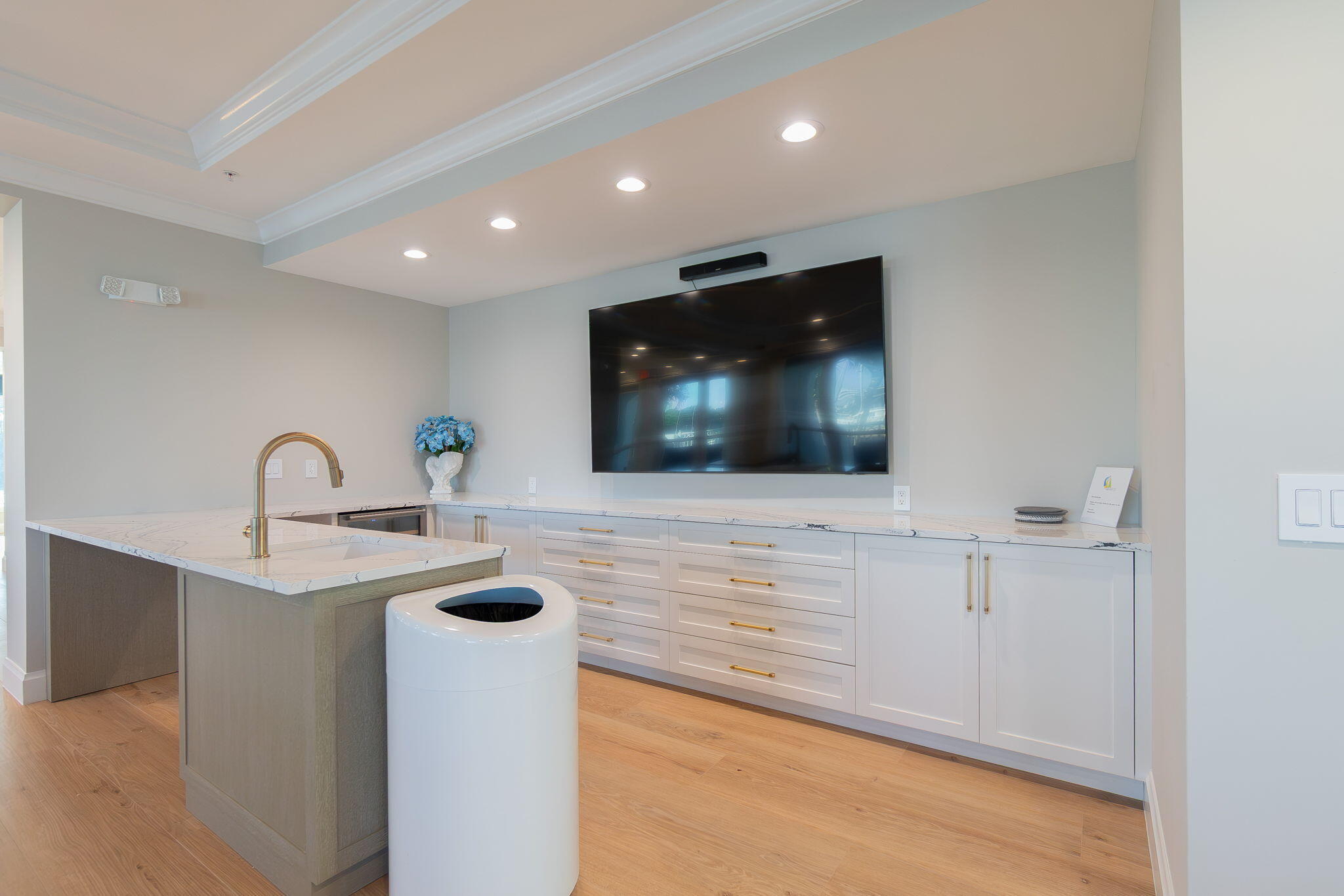 804 East Windward Way, Unit 307 Lantana, FL 33462 - Photo 35 of 44 a living room with flat screen tv and kitchen view