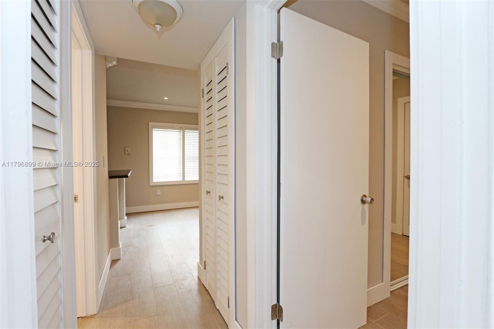 3375 Franklin Avenue, Unit D Miami, FL 33133 - Photo 13 of 33 a view of a bathroom with a glass door
