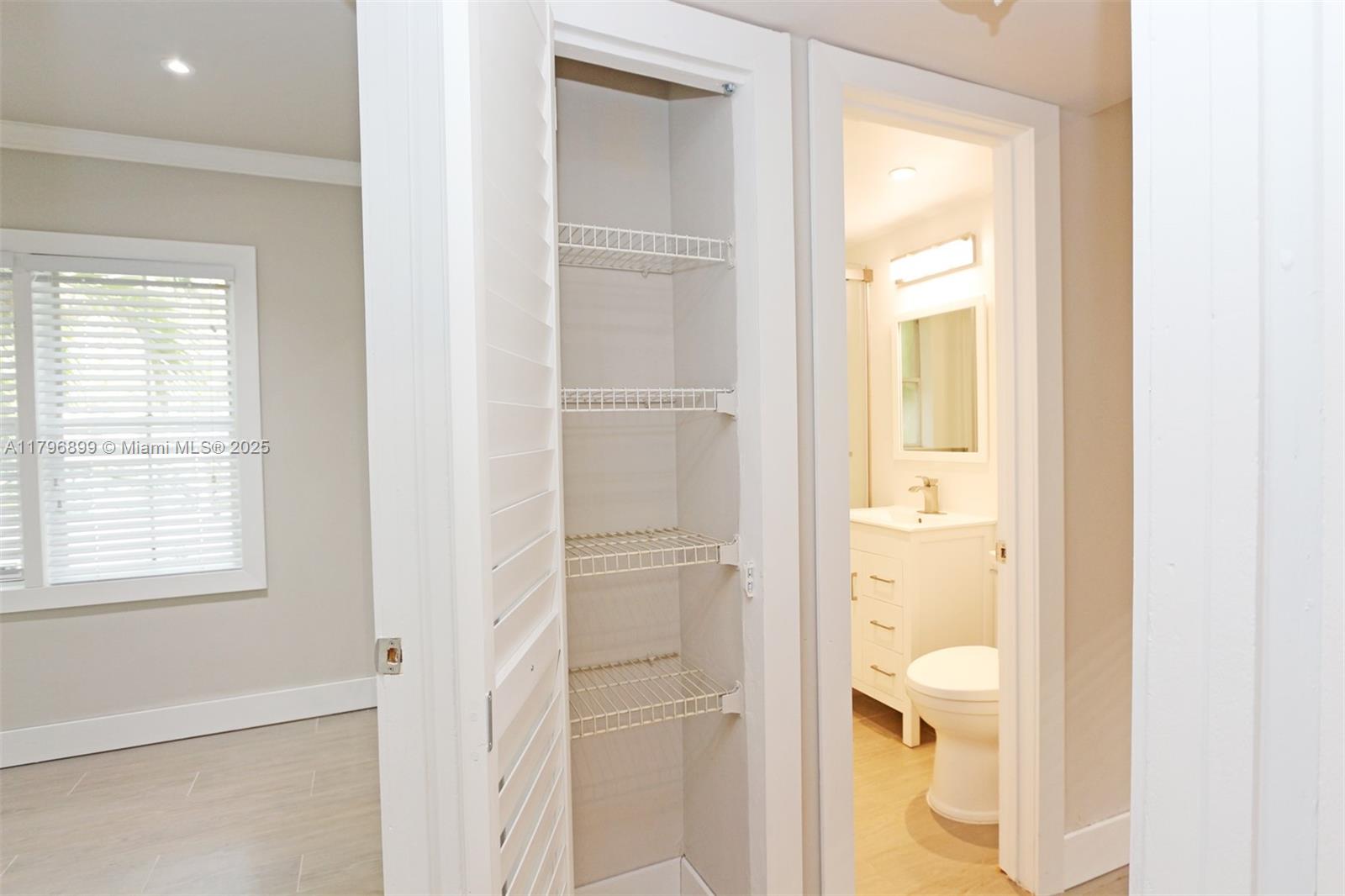 3375 Franklin Avenue, Unit D Miami, FL 33133 - Photo 18 of 33 a bathroom with a toilet sink