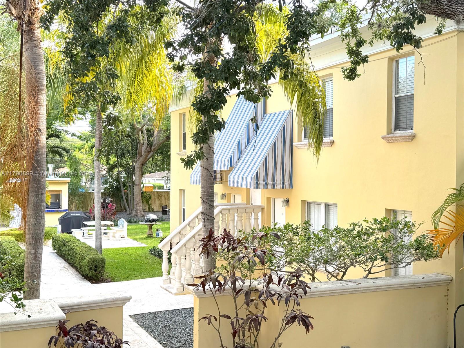 3375 Franklin Avenue, Unit D Miami, FL 33133 - Photo 2 of 33 a view of a garden with a house