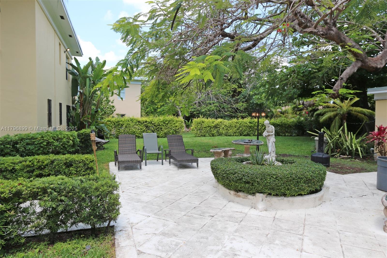 3375 Franklin Avenue, Unit D Miami, FL 33133 - Photo 26 of 33 a view of backyard with plants and outdoor seating