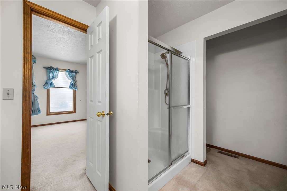 722 Jaycox Road Avon Lake, OH 44012 - Photo 27 of 48 Shower stall with glass enclosure and brushed nickel fixtures