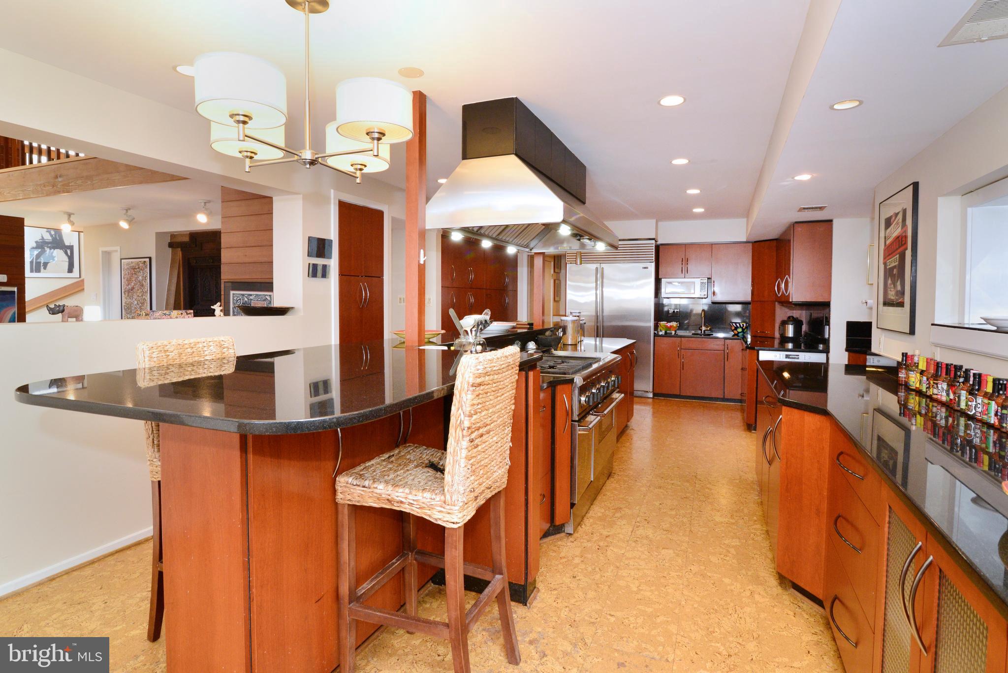 1934 Upper Lake Drive Reston, VA 20191 - Photo 31 of 60 The kitchen has granite counters and cork floors.