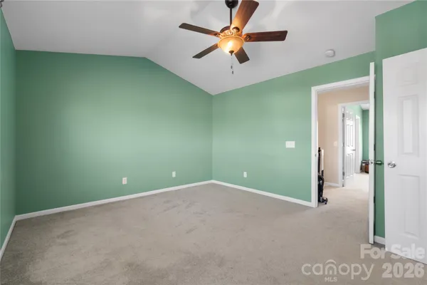 a view of a big room with carpet