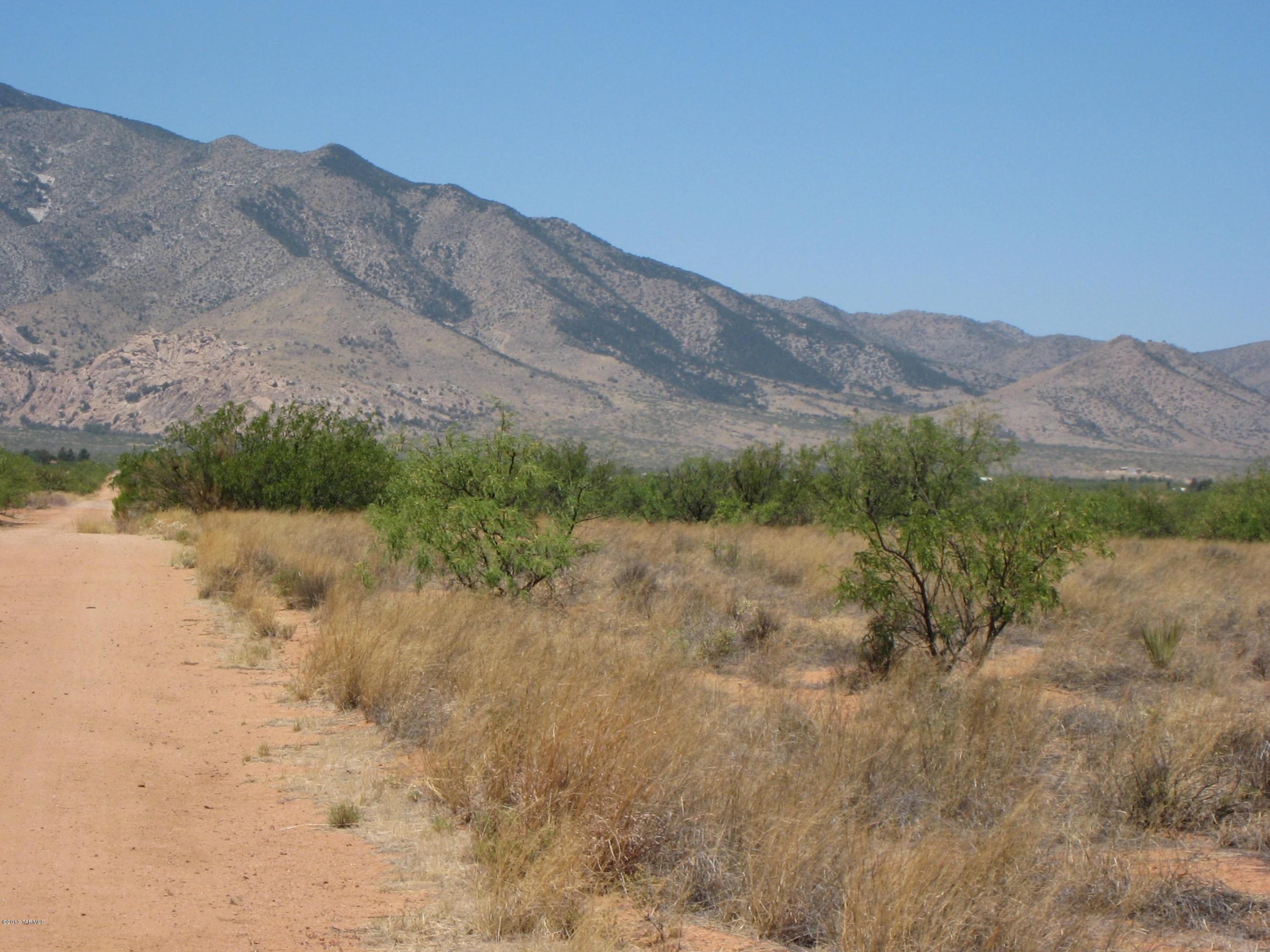 Allen Street Cochise, AZ 85606 - Photo 3 of 6 a view of a lake with mountains in the background