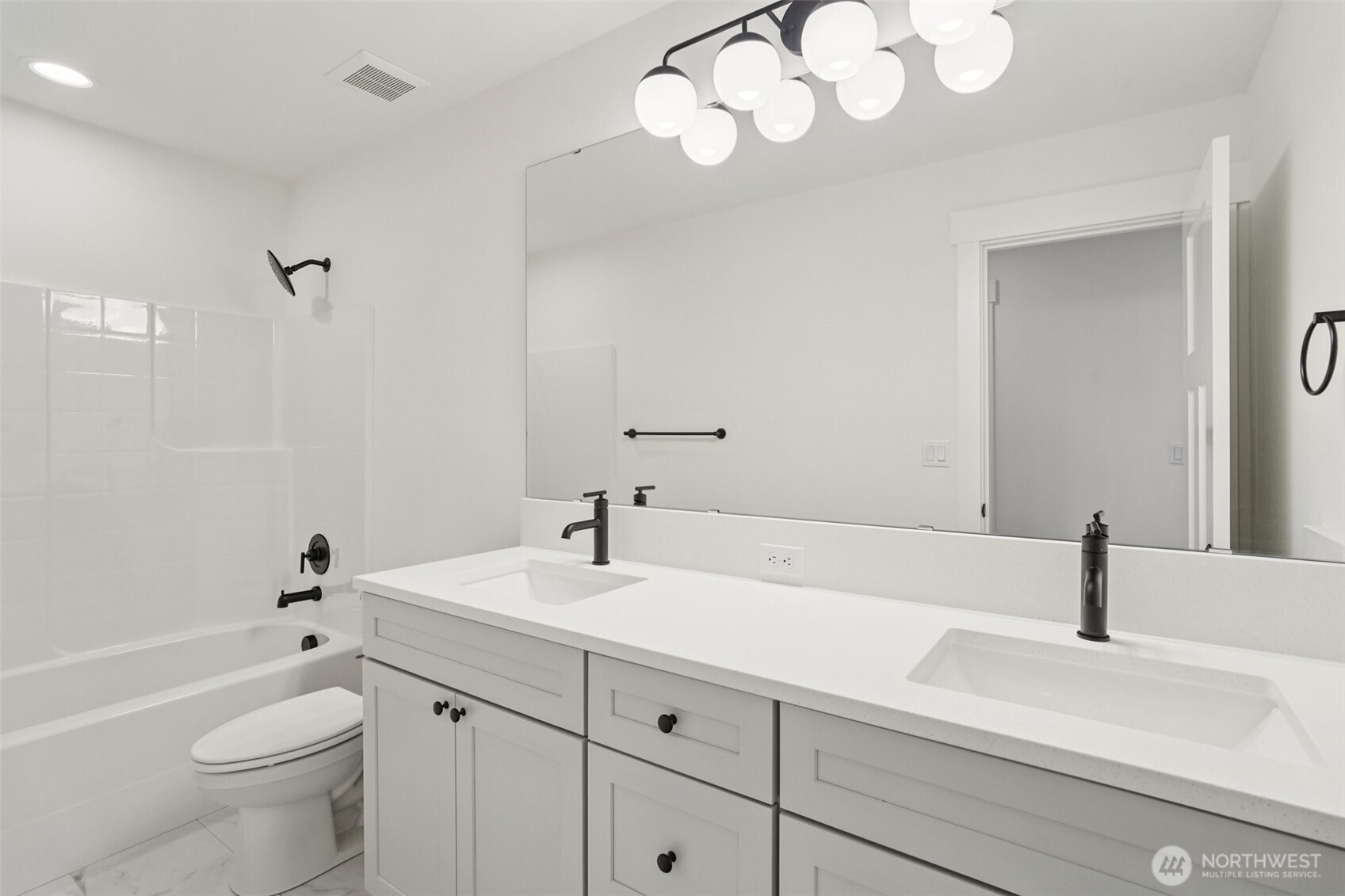 8014 222nd Street Southwest Edmonds, WA 98026 - Photo 22 of 29 a bathroom with a sink a toilet and a bathtub