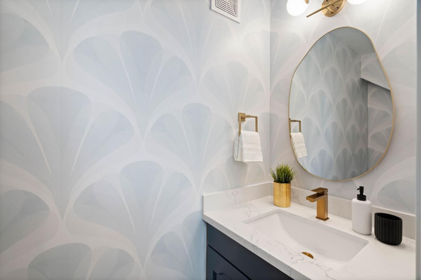 603 Sharp Park Road Pacifica, CA 94044 - Photo 13 of 27 a bathroom with a sink and a mirror