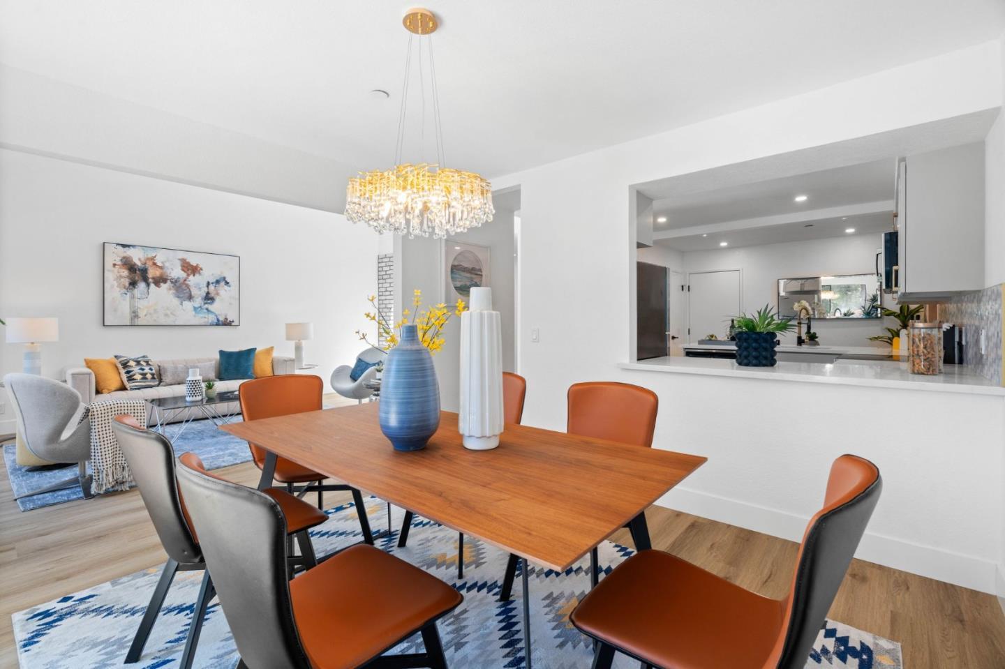 603 Sharp Park Road Pacifica, CA 94044 - Photo 7 of 27 a view of a dining room with furniture and wooden floor