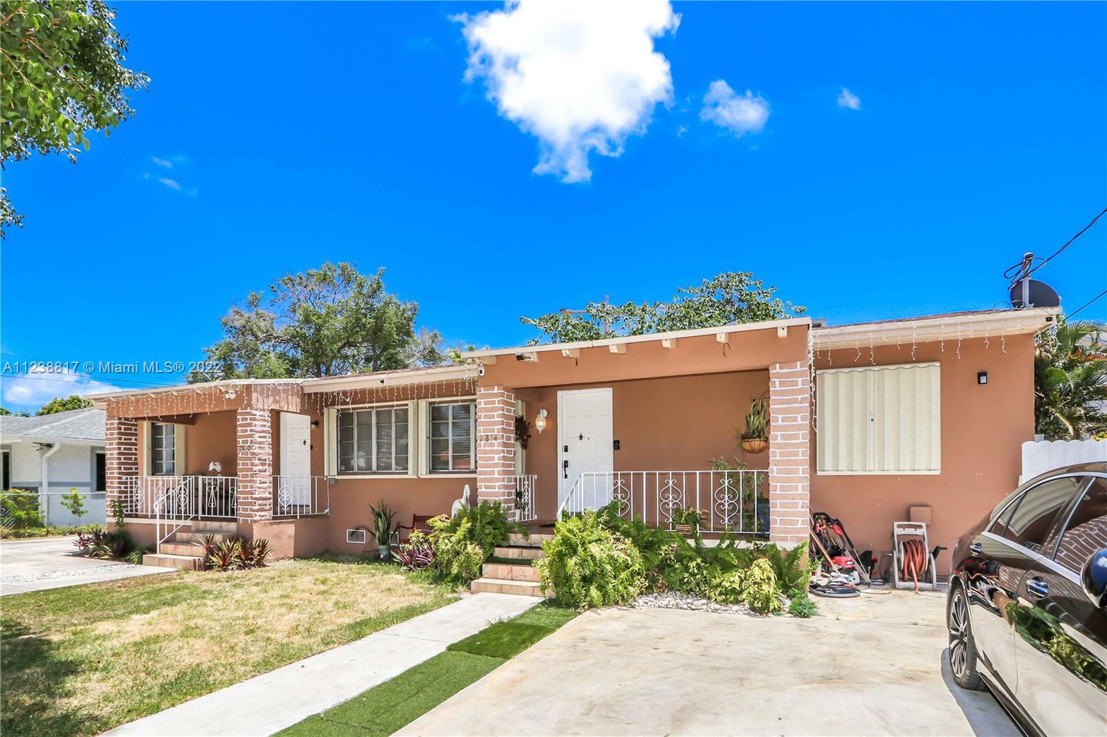 2810 Southwest 26th Street Miami, FL 33133 - Photo 21 of 33 a view of a house with backyard porch and sitting area