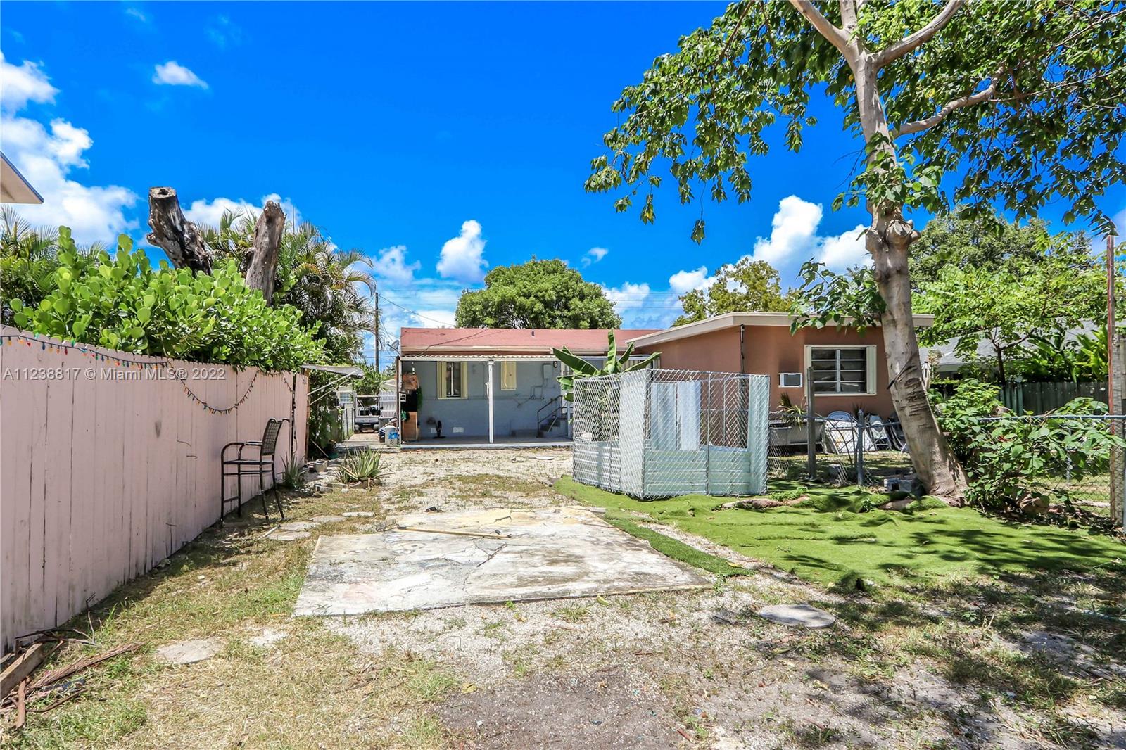 2810 Southwest 26th Street Miami, FL 33133 - Photo 22 of 33 a view of a house with a yard