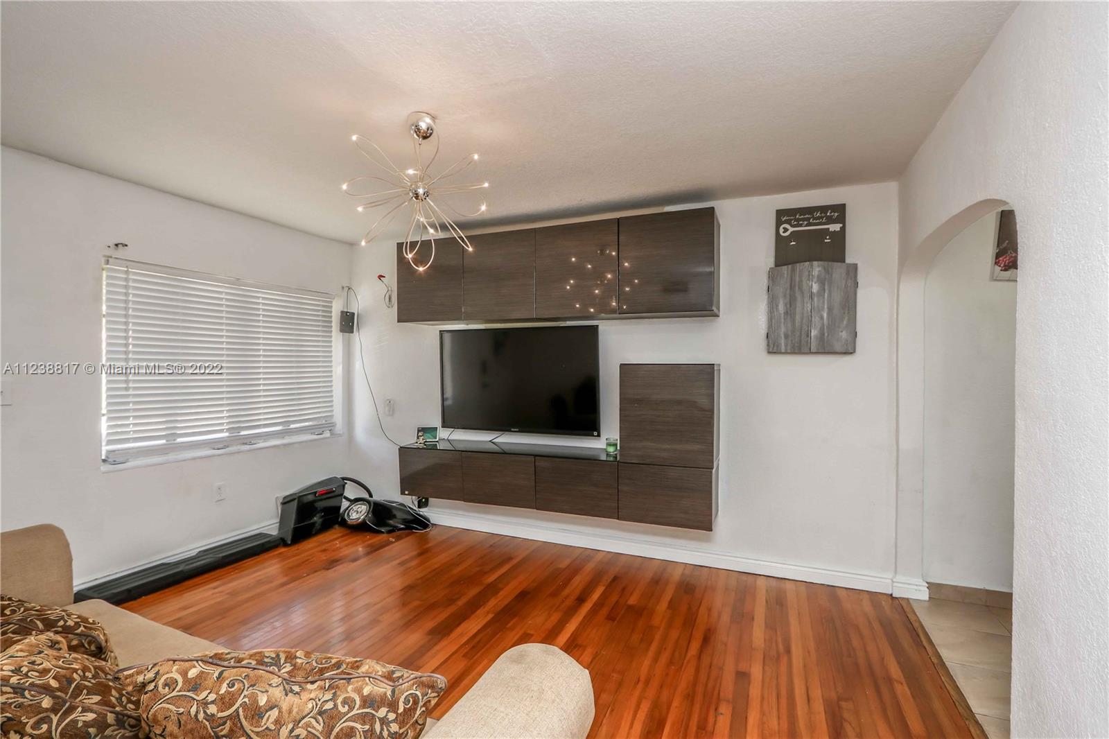2810 Southwest 26th Street Miami, FL 33133 - Photo 25 of 33 a bedroom with a bed and a flat screen tv