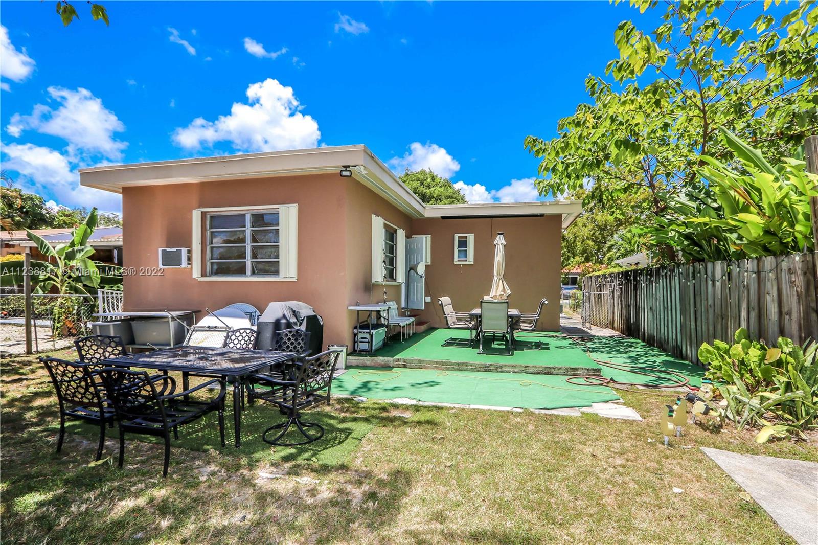 2810 Southwest 26th Street Miami, FL 33133 - Photo 7 of 33 a view of a house with backyard and sitting area