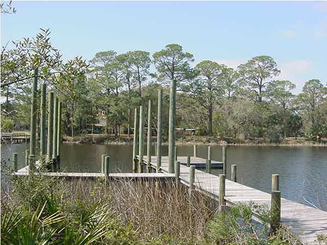 Lot 5 Windy Way Santa Rosa Beach, FL 32459 - Photo 1 of 6 a view of a lake with a mountain view