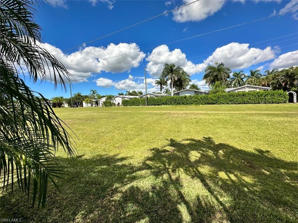 1453 Diamond Lake Circle Naples, FL 34114 - Photo 14 of 18 a view of an ocean and beach
