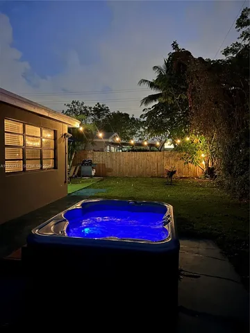 a view of outdoor space fire pit and outdoor seating