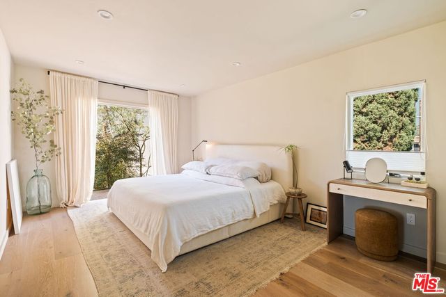 a view of a vase of flowers sitting on a table