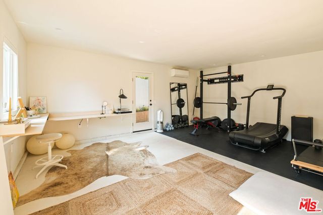 a front view of a house with trees