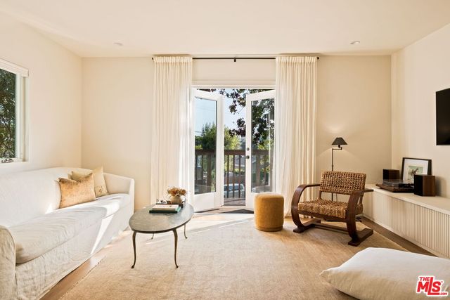 a bed room with a bed and a window