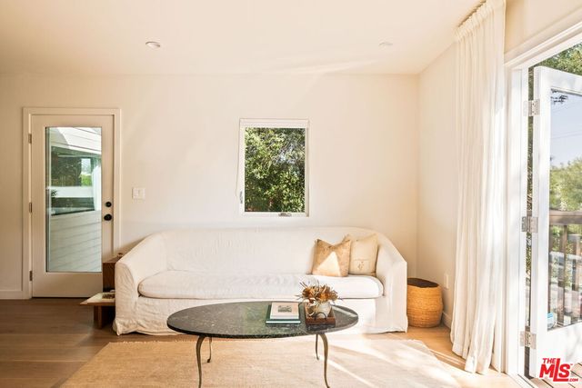 a view of a vase of flowers sitting on a table
