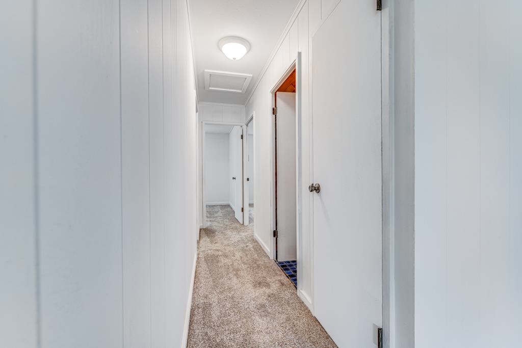 720 Mopua Street Haiku, HI 96708 - Photo 12 of 22 a view of a bathroom from the hallway