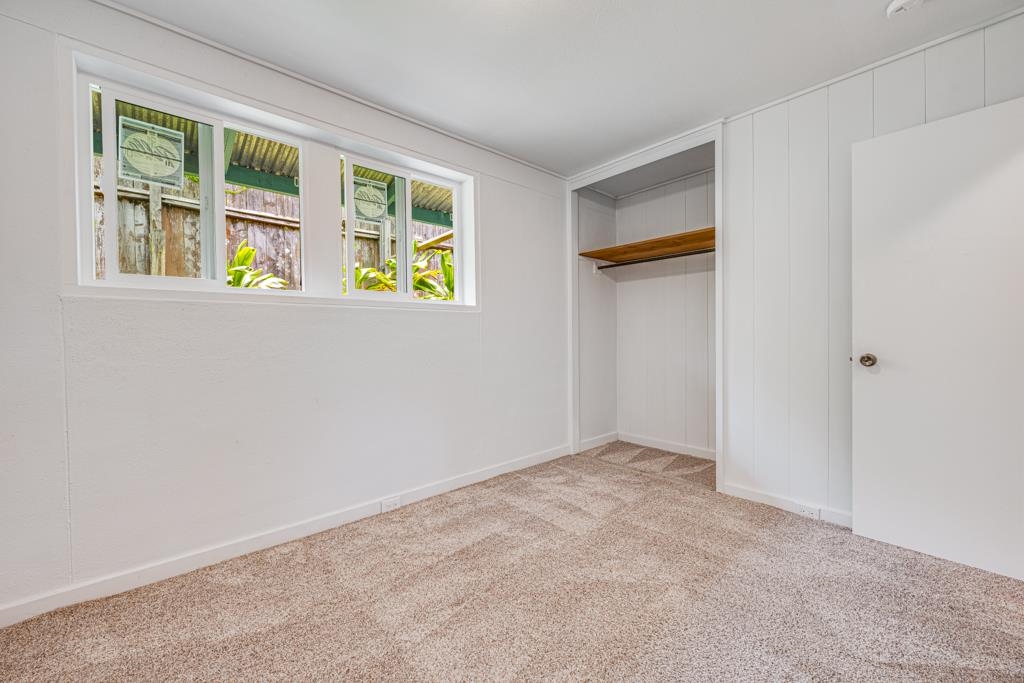 720 Mopua Street Haiku, HI 96708 - Photo 15 of 22 a view of an empty room with a window