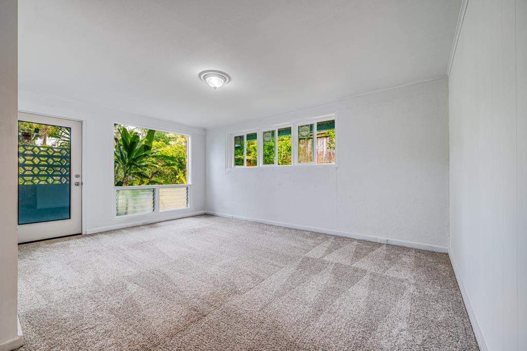 720 Mopua Street Haiku, HI 96708 - Photo 5 of 22 an empty room with windows