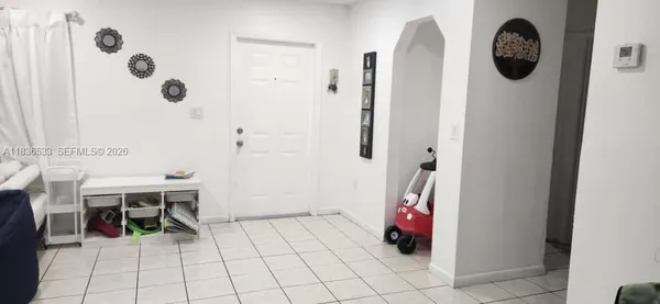 a view of a hallway with entryway