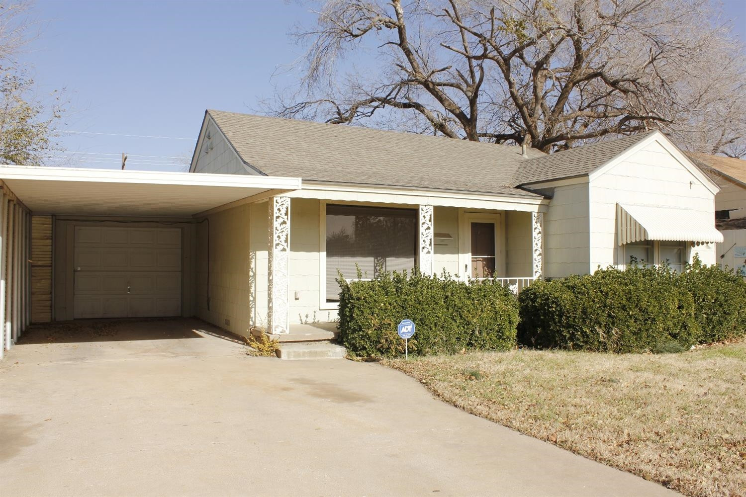 2222 22nd Street Lubbock, TX 79411 - Photo 1 of 9 a front view of a house with garden
