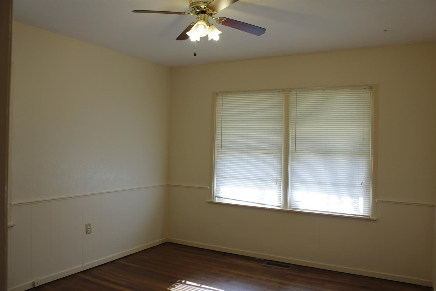 2222 22nd Street Lubbock, TX 79411 - Photo 7 of 9 an empty room with a window